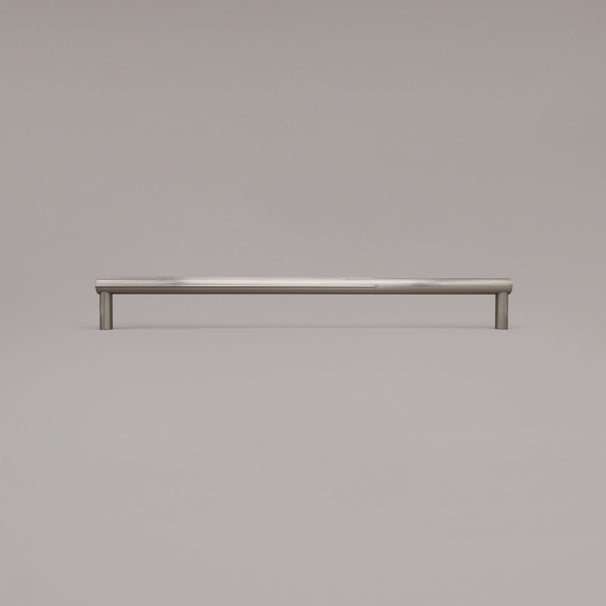 18" Sunburst appliance pull in Satin Nickel standing on gray background