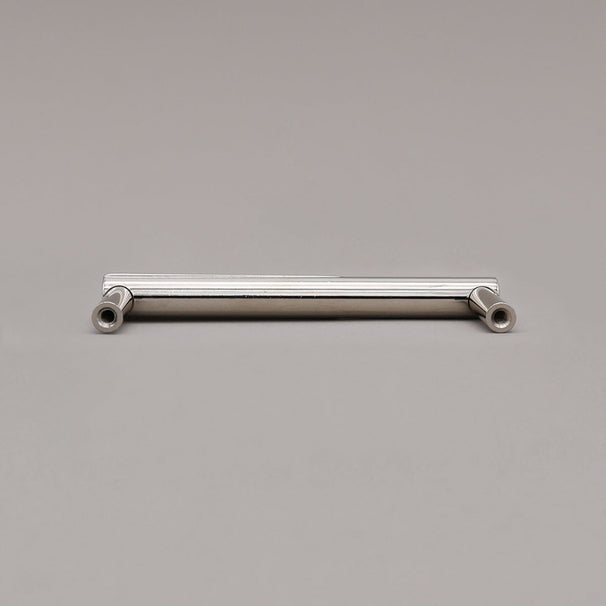 small polished nickel sunburst pull rear view on gray background