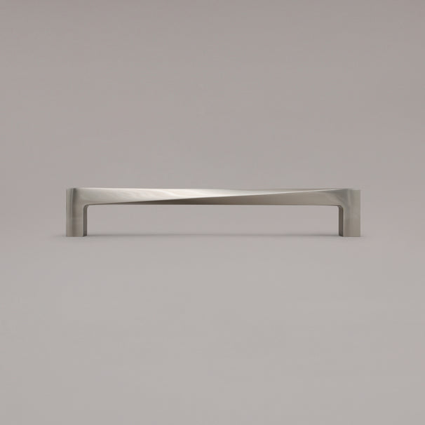 12" twist appliance pull in satin nickel standing on gray background