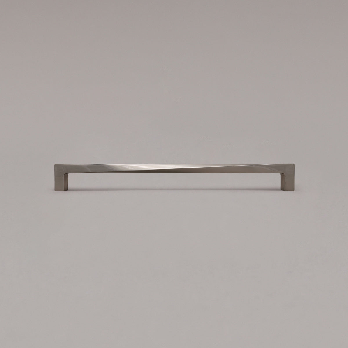 18" twist appliance pull in satin nickel standing on gray background