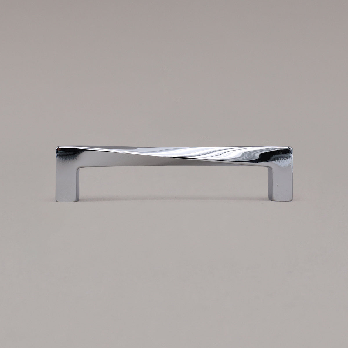 Medium polished chrome twist pull standing on gray background