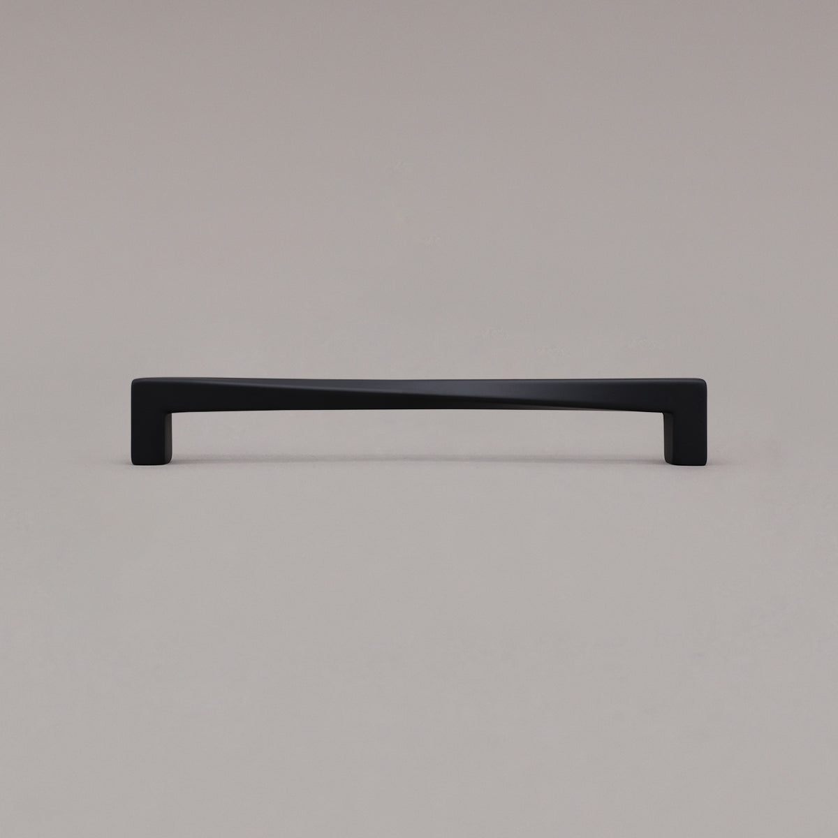 Large matte black twist pull standing on gray background