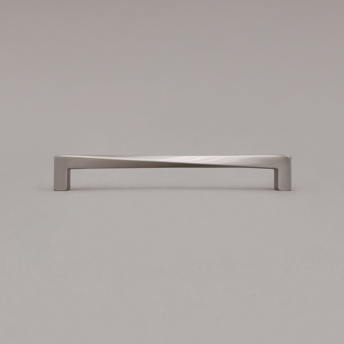 Large satin nickel twist pull standing on gray background