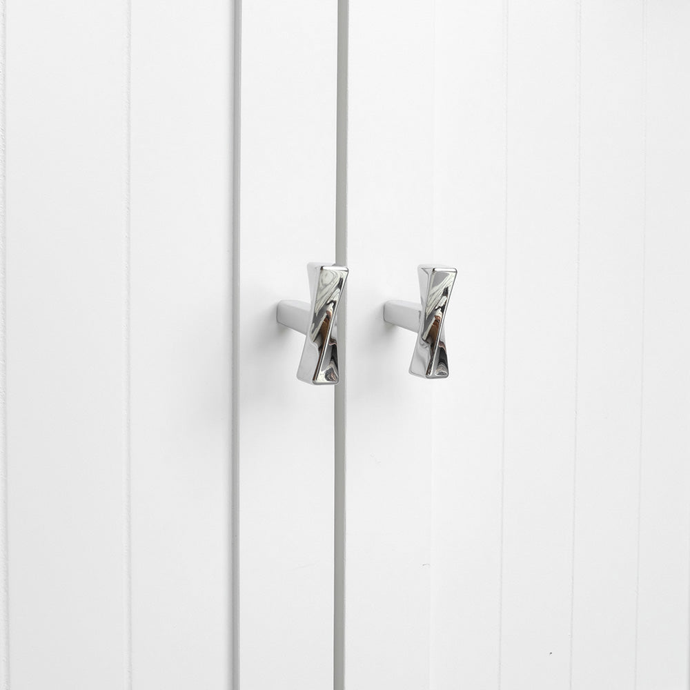 White cabinet doors with polished chrome twist knobs on a white background