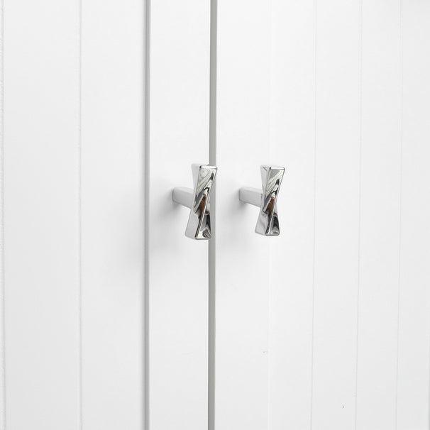 White cabinet doors with polished chrome twist knobs on a white background