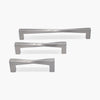 Set of three cabinet pulls for twist collection in satin nickel