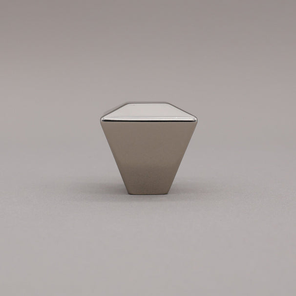 polished nickel geometric diamond knob on a gray background standing