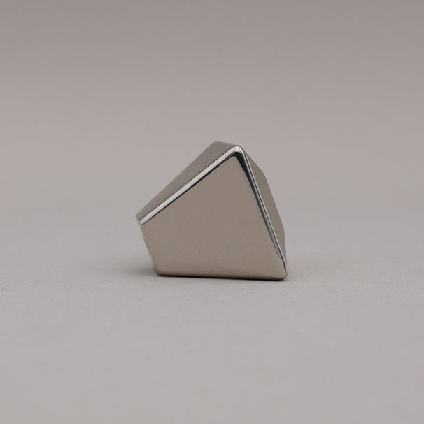 polished nickel geometric diamond knob on a gray background side view