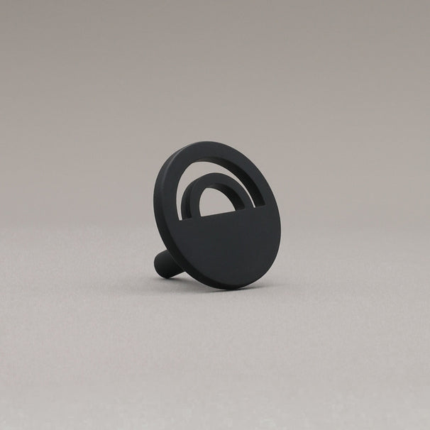 Horizon Matte Black Knobs at angle on grey background.