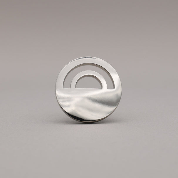 Horizon Polished Nickel Knobs on grey background.