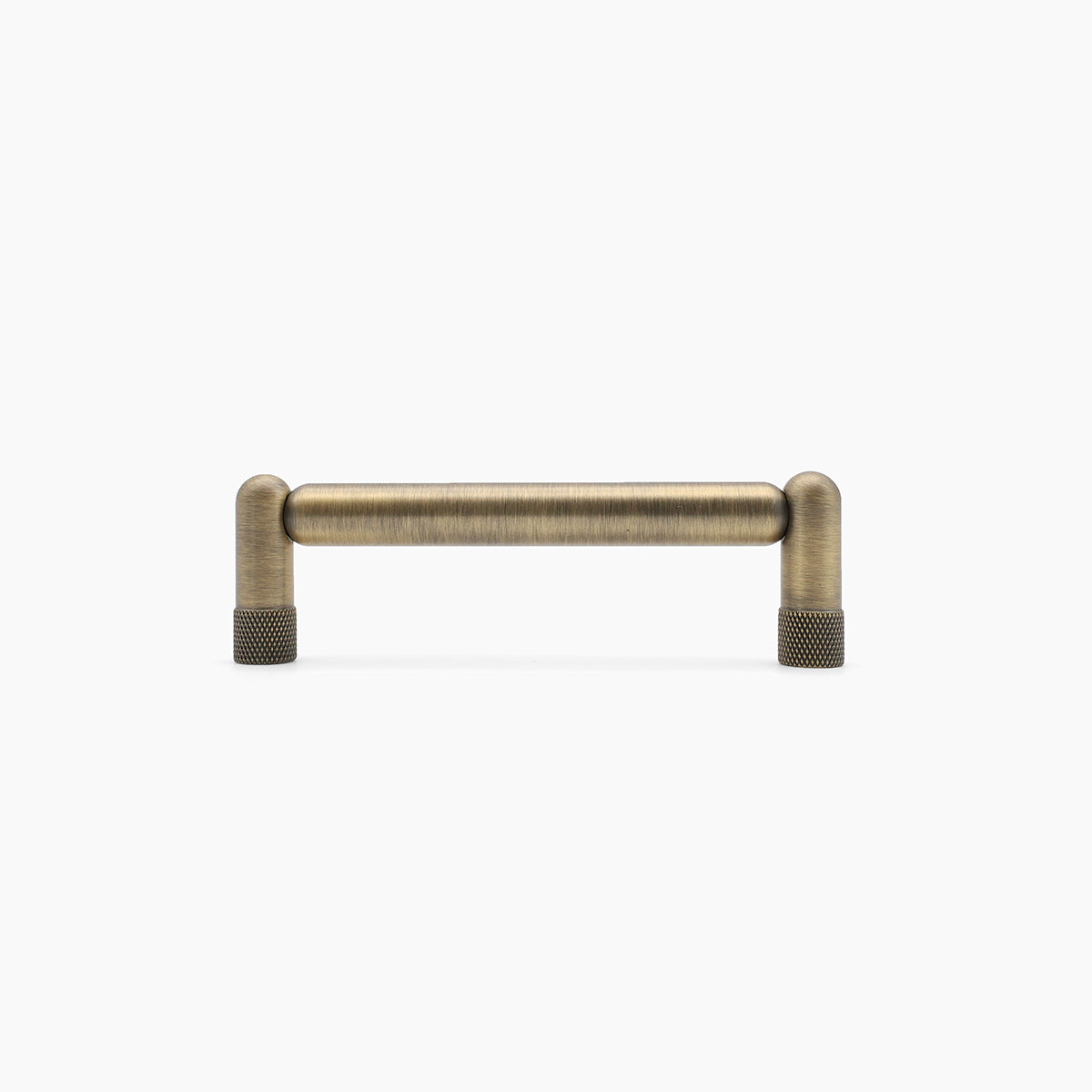 Aged brass cabinet handle on a white background,