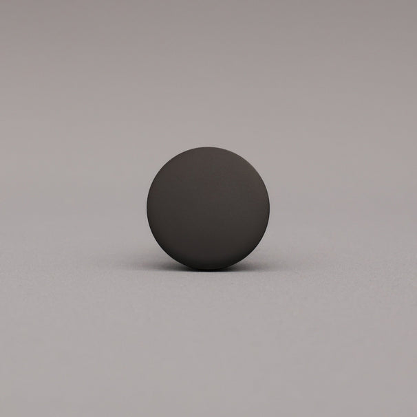 Black sphere on a gray background