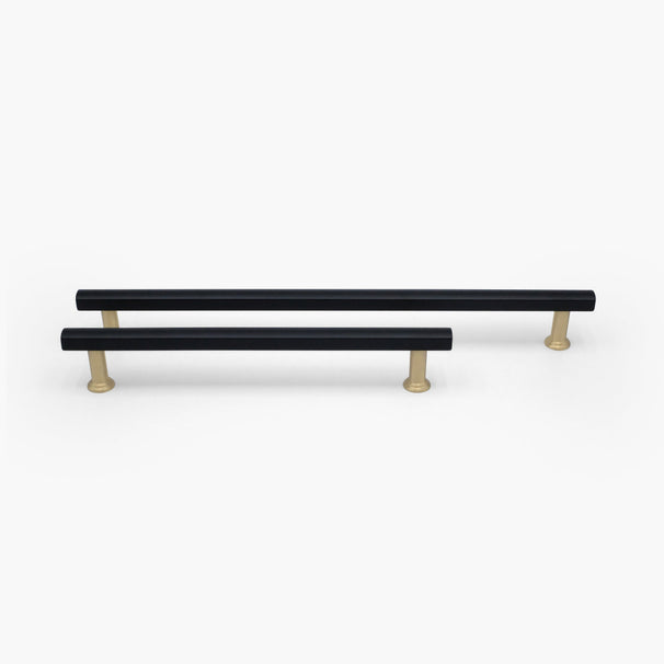 12" and 18" Mod appliance pulls in Black and Satin Brass standing on white background