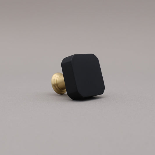 satin brass gold square mod knob on gray background