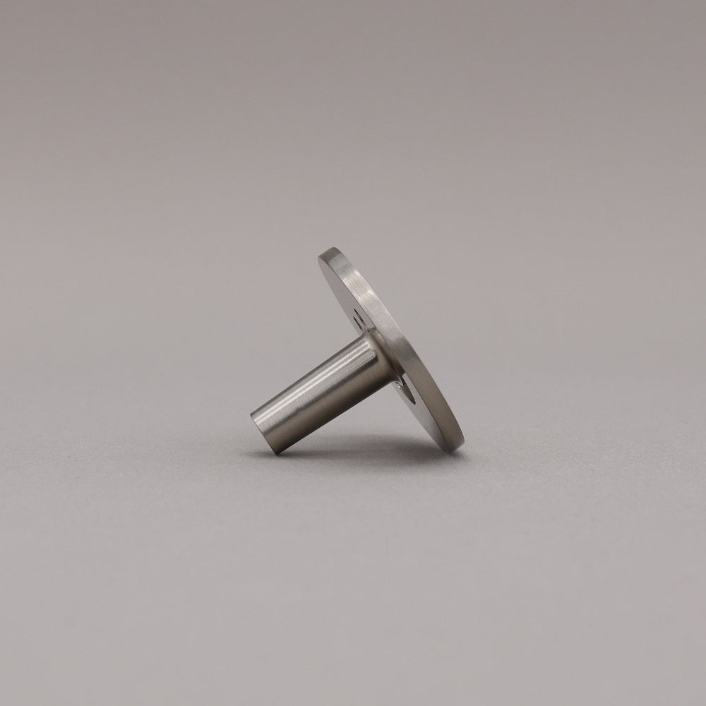 Profile view of satin brass smiley knob.