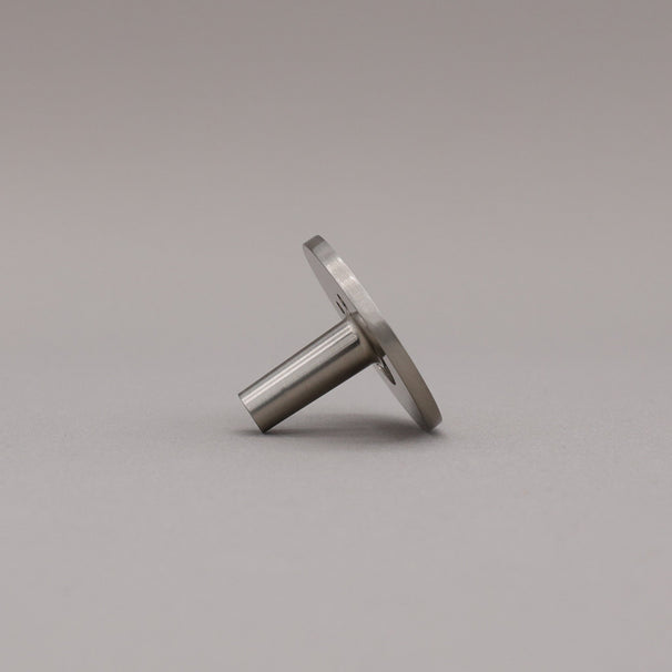 Profile view of satin brass smiley knob.