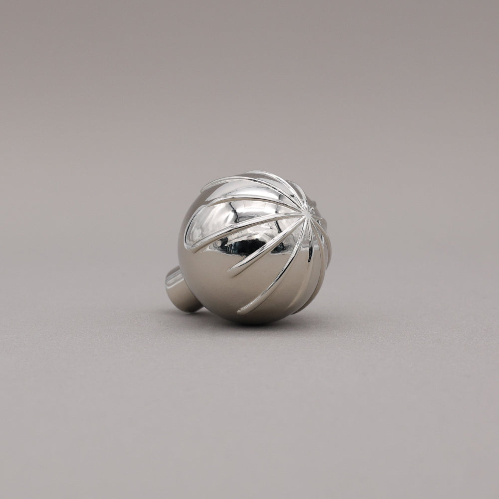 Sunburst round polished nickel knob at angle.