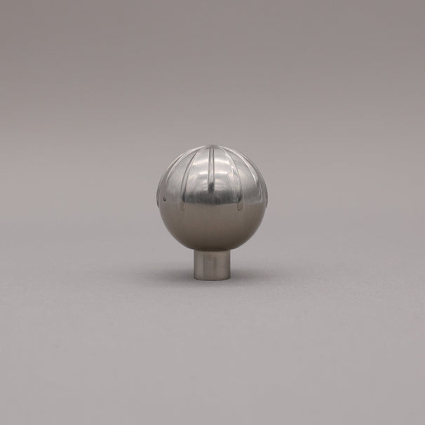Round sunburst knob silver nickel silver on gray background