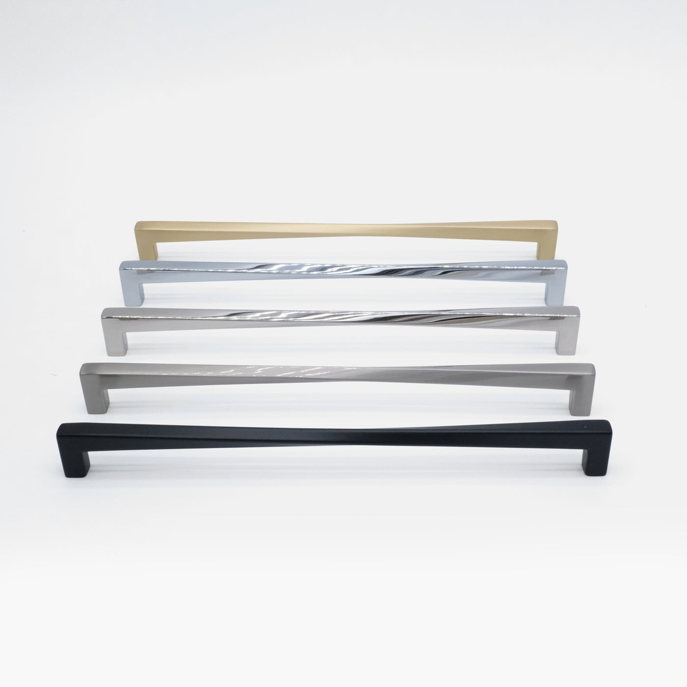 Five twisted appliance pulls arranged in a line, one in each offered finish