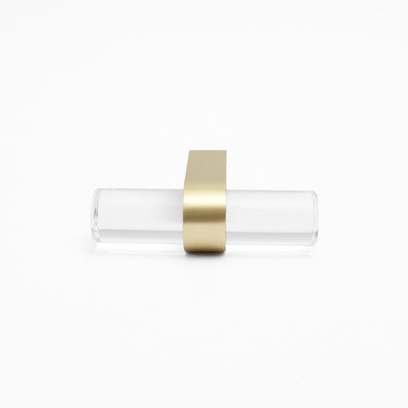 Front-facing, laying down view of Clarity T-Knob in Clear Acrylic and Satin Brass finish