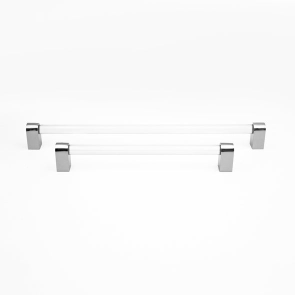 Two Hapny Clarity appliance pulls standing, a 12” center to center Clear Acrylic and Polished Nickel and a 18” Clear Acrylic and Polished Nickel