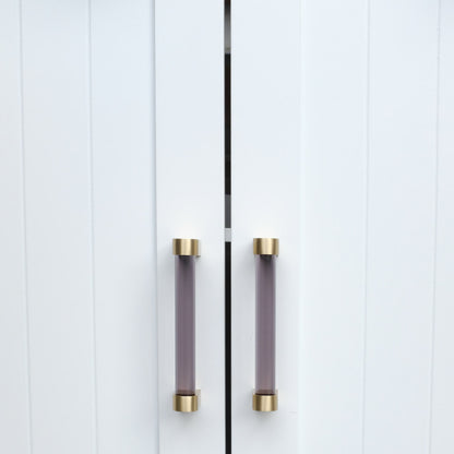 Two Clarity 96mm center to center cabinet pulls in Smoke Acrylic and Satin Brass installed on white cabinet doors