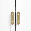 Two Hapny Horizon 4" center to center cabinet pulls in Satin Brass shown installed on white cabinet doors