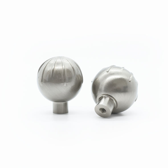 Two Satin Nickel Hapny Sunburst knobs, one standing and one rear-facing while laying down