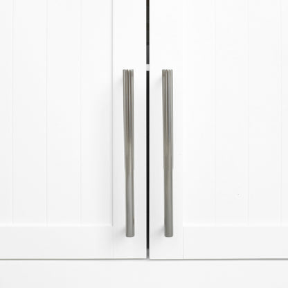 Two Satin Nickel Hapny Sunburst 8" cabinet pulls installed on white cabinet doors