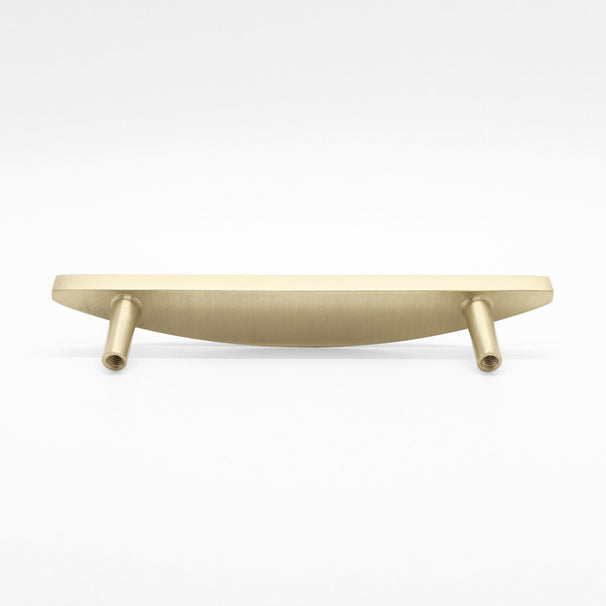 Rear-facing, laying down view of a Half Moon cabinet pull in Satin Brass