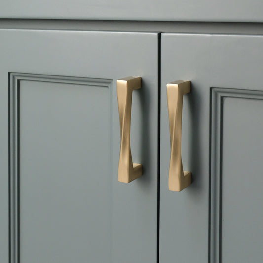 Matte Black Cabinet Pulls and Handles of our Twist Collection in three different sizes.